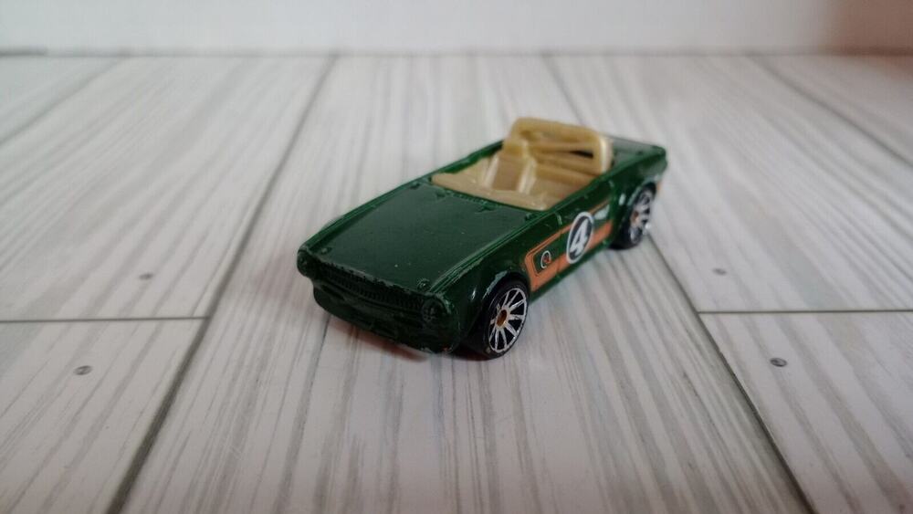 2009 Mattel Hot Wheels 1969 Triumph TR6 - 1:64 - Made in Malaysia